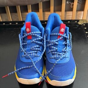 Kids Curry Under Armour Blue and Yellow Athletic Shoes